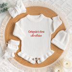 Personalized Name First Christmas Ruffle Romper – Script Embroidered Knit with Frill Trim