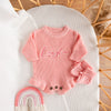 Chunky knit frill leg newborn announcement romper