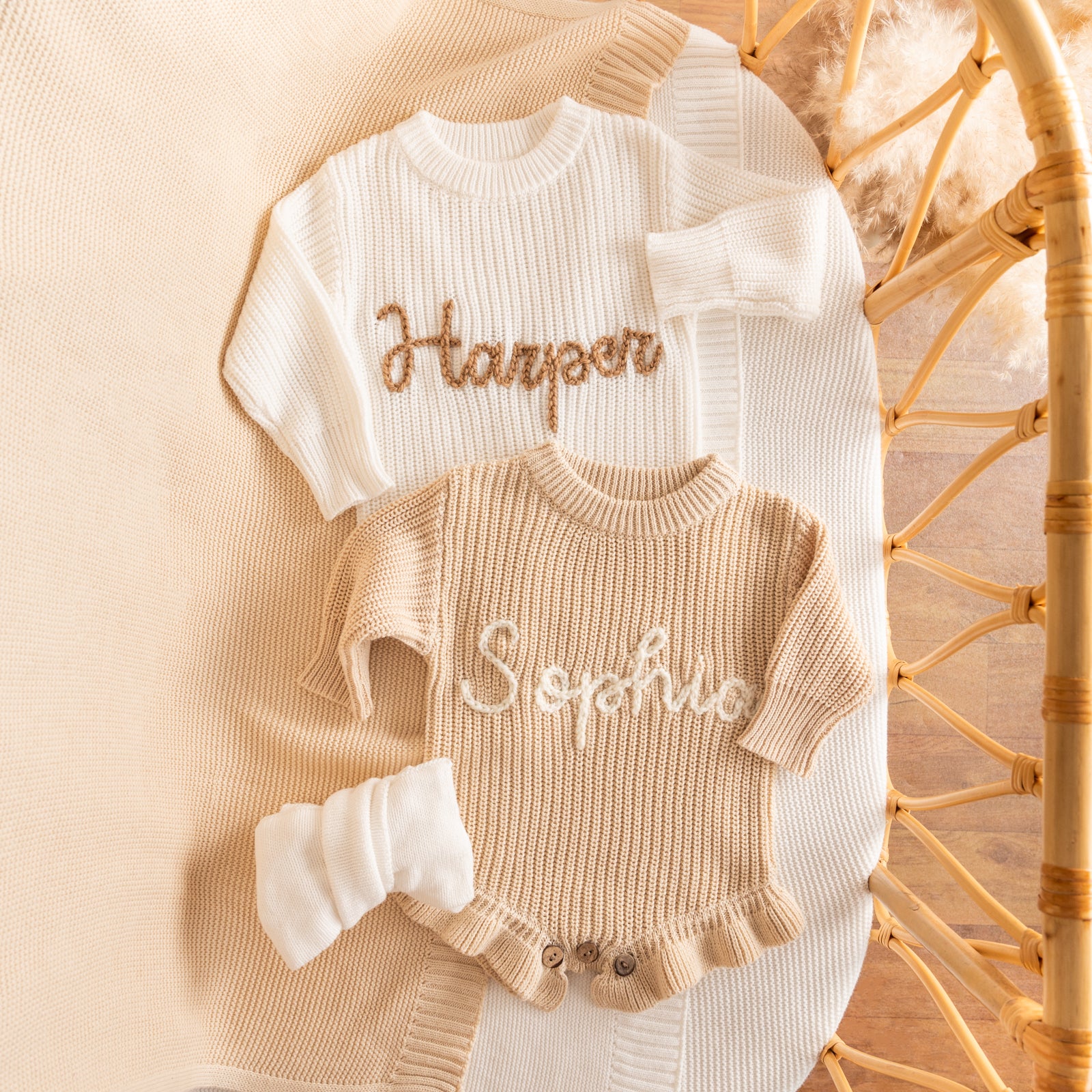Hand-knit frill leg newborn announcement romper