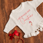 Personalized Name First Christmas Ruffle Romper – Script Embroidered Knit with Frill Trim