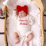 Personalized Name First Christmas Ruffle Romper – Script Embroidered Knit with Frill Trim